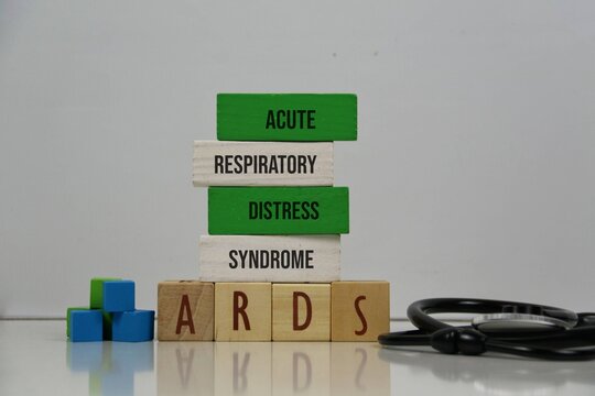 Acute Respiratory Distress Syndrome (ARDS) Concept With Wooden Blocks And Stethoscope On white Background