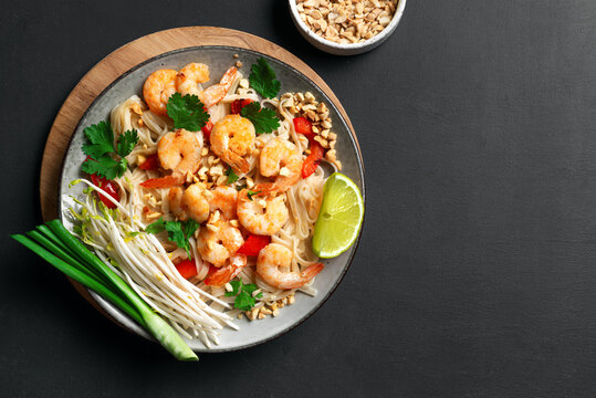 Pad Thai noodles with shrimps, prawns. Traditional thai meal.