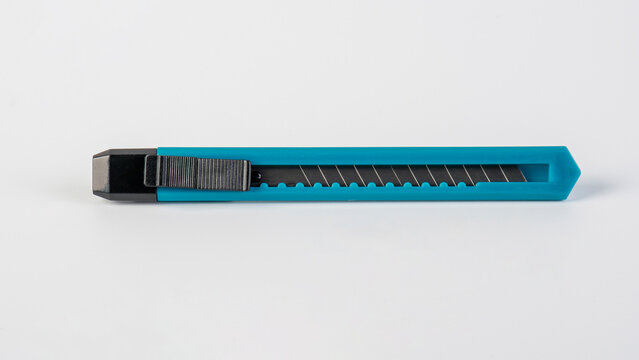 A blue cutter, an office supply on white background.