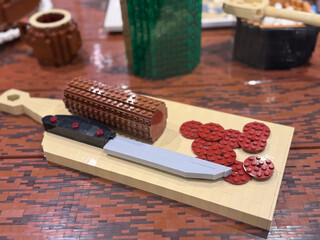 Obraz premium Lego knife with loaf on cutting board lego 