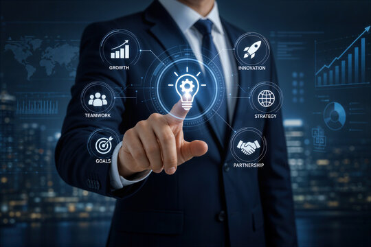 Businessman touching virtual screen with futuristic business icons for innovation growth strategy teamwork partnership and goals in professional corporate setting digital interface concept