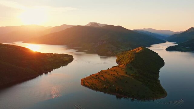 Kardzhali reservoir horseshoe bend meander sunset sun rays drone aerial view arda river bulgaria summer travel landscape water curves mountain hills golden hour scenic viewpoint