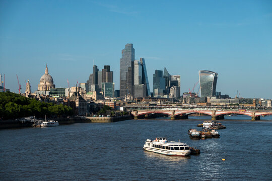 London, UK, 27th May 2026 - London Skyline from Waterloo bridge showing building work in progress and the main financial district, late  evening suchine, tight shot with details of buildings