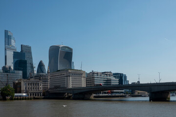 Fototapeta premium London, UK, 27th May 2026 - The confused skyline of London's financial district with London Bridge. Modern financial architecture