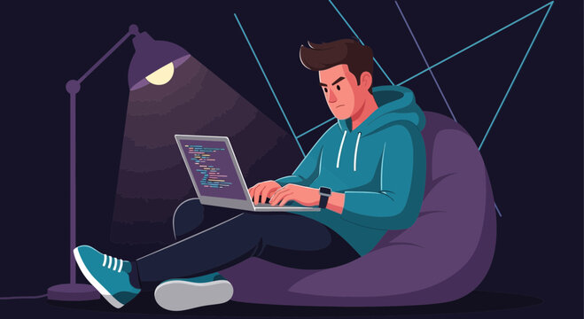 Young man using laptop on bean bag chair at night, coding under lamp light