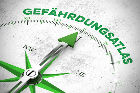 Gr&uuml;ner Kompass zeigt auf Schriftzug &bdquo;Gef&auml;hrdungsatlas&ldquo;