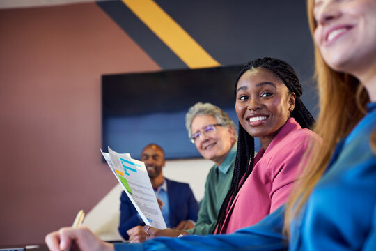 Happy african businesswoman smiling during business meeting