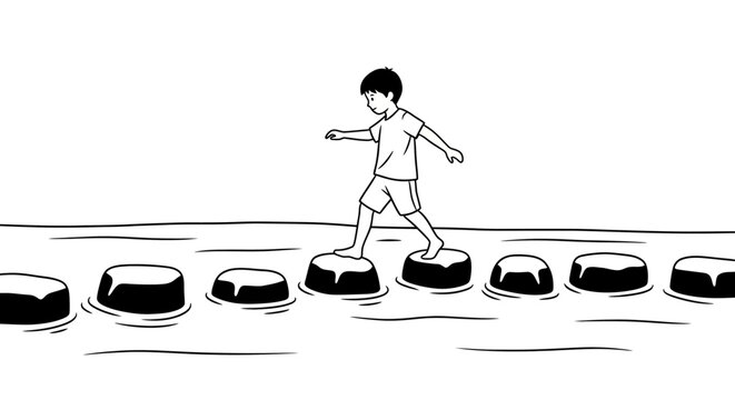 Young boy carefully balancing on floating stepping stones.