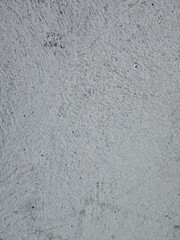 Fototapeta premium Rough light gray concrete wall texture background