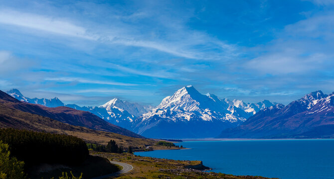 The landscape view with coast of road highway with mount cook mountain and  Blue pukaki lake landscape view background,Travel concept