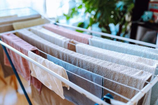 clothes are dried on a clothes dryer indoors
