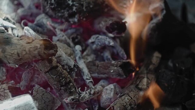 Cinematic glowing barbecue embers in dark atmosphere