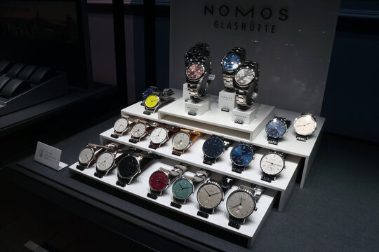 Leipzig, Germany, May 3, 2026: Elegant Display of Nomos Glashutte Watches in a Boutique Setting for Luxury Retail Promotion