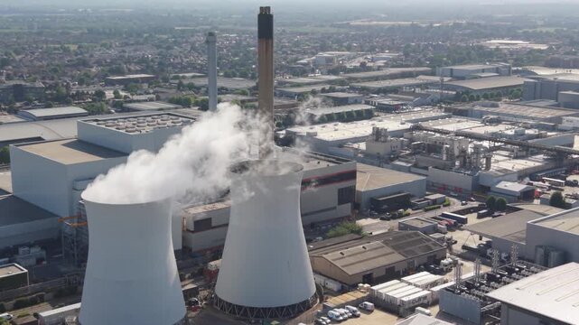Multifuel Waste to Energy Plant Emits Steam and Exhaust Daytime