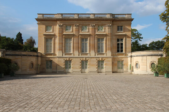 mansion (petit trianon) in the gardens of the palace of versailles in france 