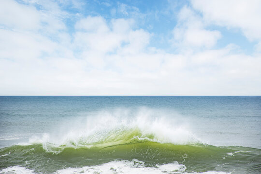 Ocean wave splashing on shore