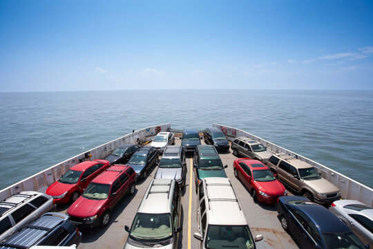 Rows of cars on ferry boat