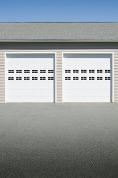 Closed garage doors on sunny day