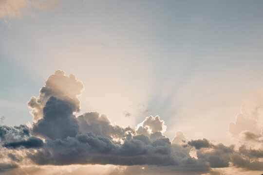 Puffy Cumulus clouds at sunrise