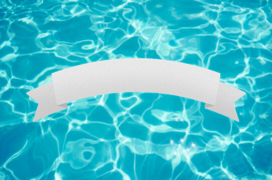 Blank banner in front of swimming pool