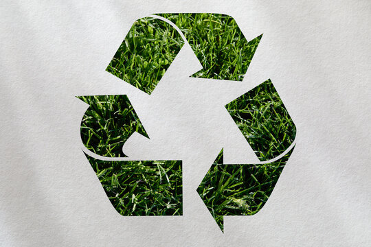 Grass recycling icon on white background