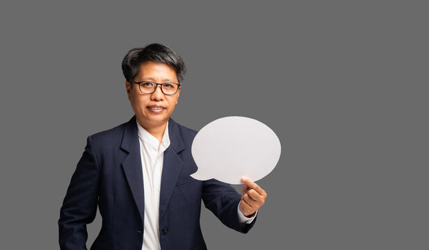 Female Executive Holding Speech Bubble Sign