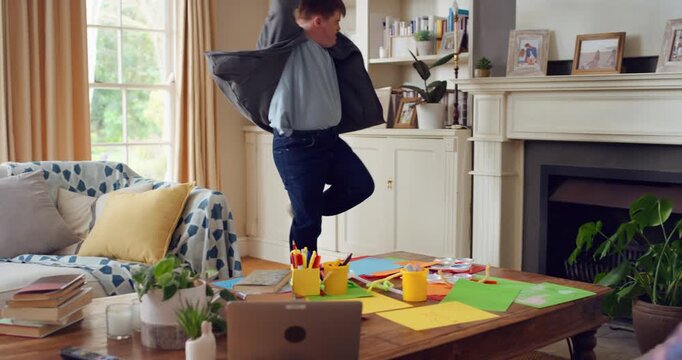 Active, man and dance in lounge, education and celebration for finished project on laptop or success. Student, rhythm and person with down syndrome on study break, achievement and movement in home