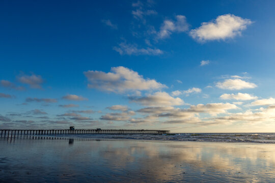 Oceanside Pier and calm ocean in late afternoon
