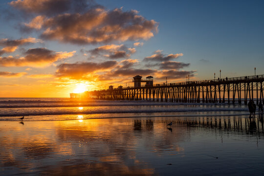 Oceanside Pier and calm ocean at sunset