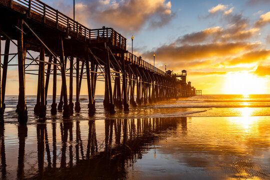 Oceanside Pier and calm ocean at sunset
