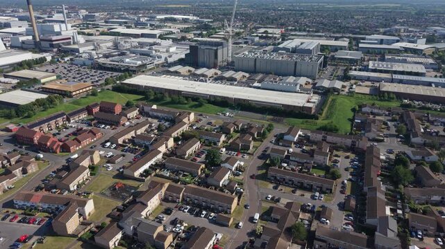 Daytime Drone View of Data Center Complex and Nearby Homes