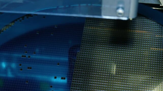 Semiconductor Pick and Place Automated Robot Arm Lifting Silicon Die from Wafer in 4K Ultra HD footage.
