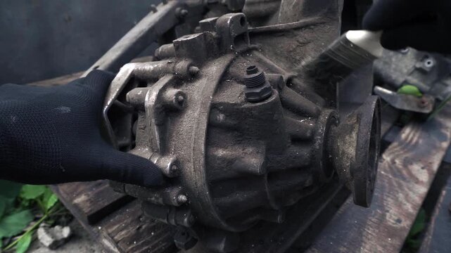 manual transmission from an old car removed for cleaning and washing, repair and replacement of oil seals