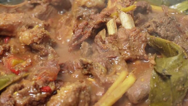 Closeup footage of rendang on the pan