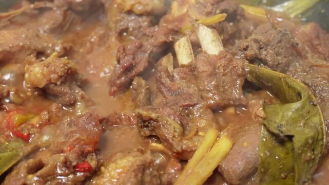 Closeup footage of rendang on the pan