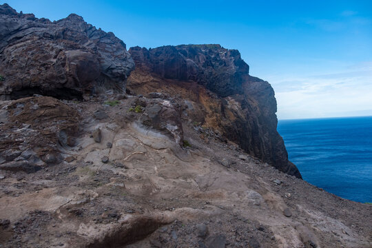 Viewpoint Calhau da Furna do Bode on Madeira, green hills meet sea, discovery archipelago landscape, volcanic island travel, adventure vacation, colorful rooftops, Madeira, Portugal