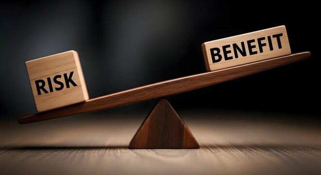 Wooden blocks with 'risk' and 'benefit' on a balance scale