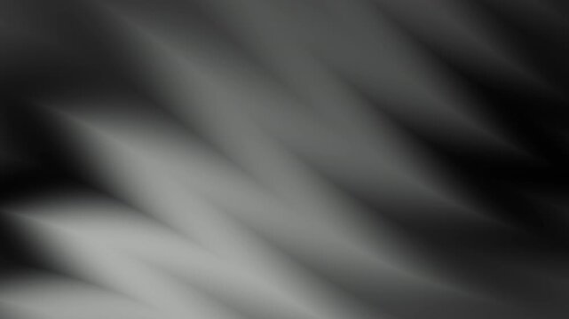 Abstract gradient light motion texture pattern suitable for design projects needing a soft, smooth, and elegant monochrome background element.