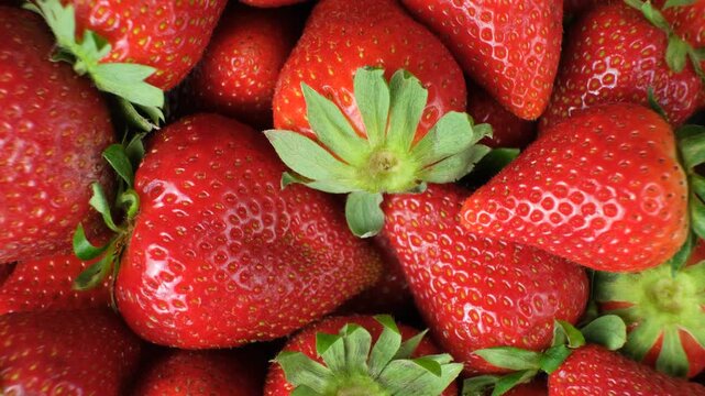 Fresh ripe strawberries background top view