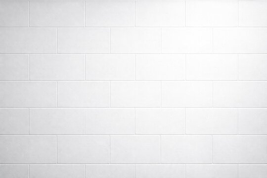 Smooth white cement block wall background with high key lighting and copy space