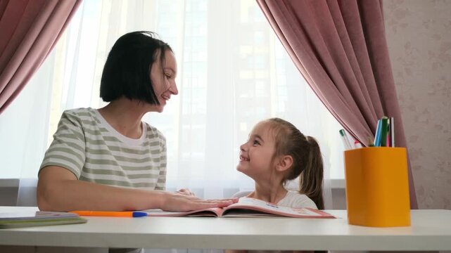 Guided independence child studying at home modern education concept with mum
