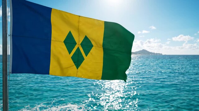 Flag of Saint Vincent and the Grenadines waving by sea