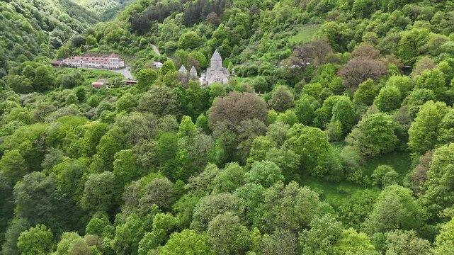 4K UHD Drone Aerial View of Haghartsin Monastery Hidden in Lush Forested Mountains.