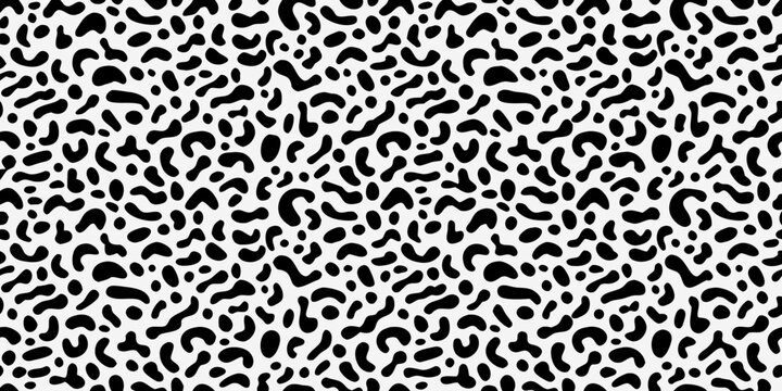 Irregular black and white spotted pattern abstract organic shapes