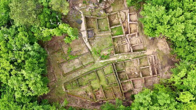 Aerial rotating view of the Castro de Armea ancient ruins in Galicia