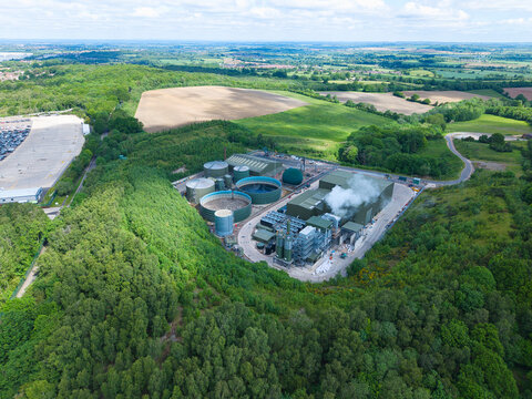 Close-up aerial view of an anaerobic digestion biomass plant and renewable waste-to-energy facility near Tamworth, UK