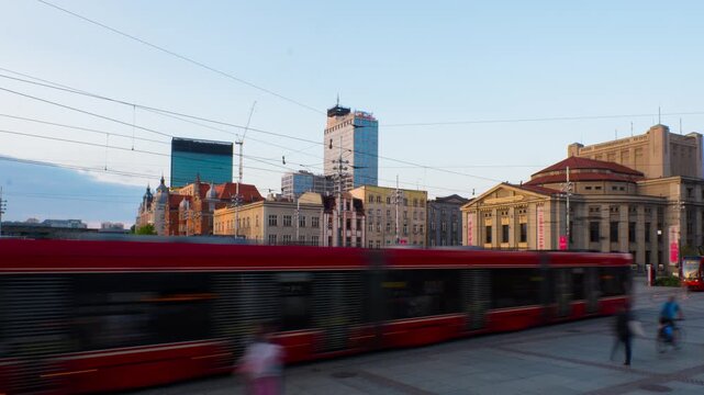 Katowice, Poland. View of historical and modern building in the center of Katowice, Poland in the evening. Time-lapse with car and people traffic