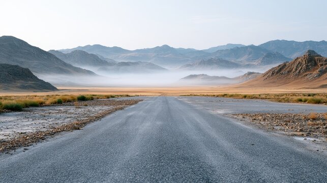 In the early morning, an empty parking lot shows scattered debris, with a large open sky and muted tones dominating the scene
