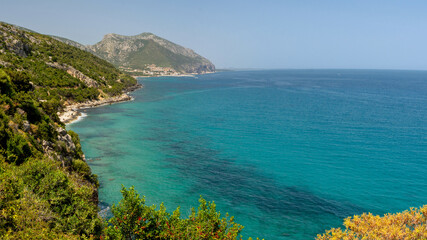 Naklejka premium Panoramic view of the Gulf of Orosei with Cala Gonone coastal town in the background, Sardinia, Italy