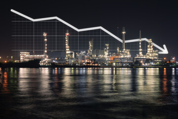 Fototapeta premium Oil refinery plant in Bangkok, Thailand, illuminated at night reflected across water. Downward-trending financial graph overlay, Highlight falling oil prices and declining market demand.